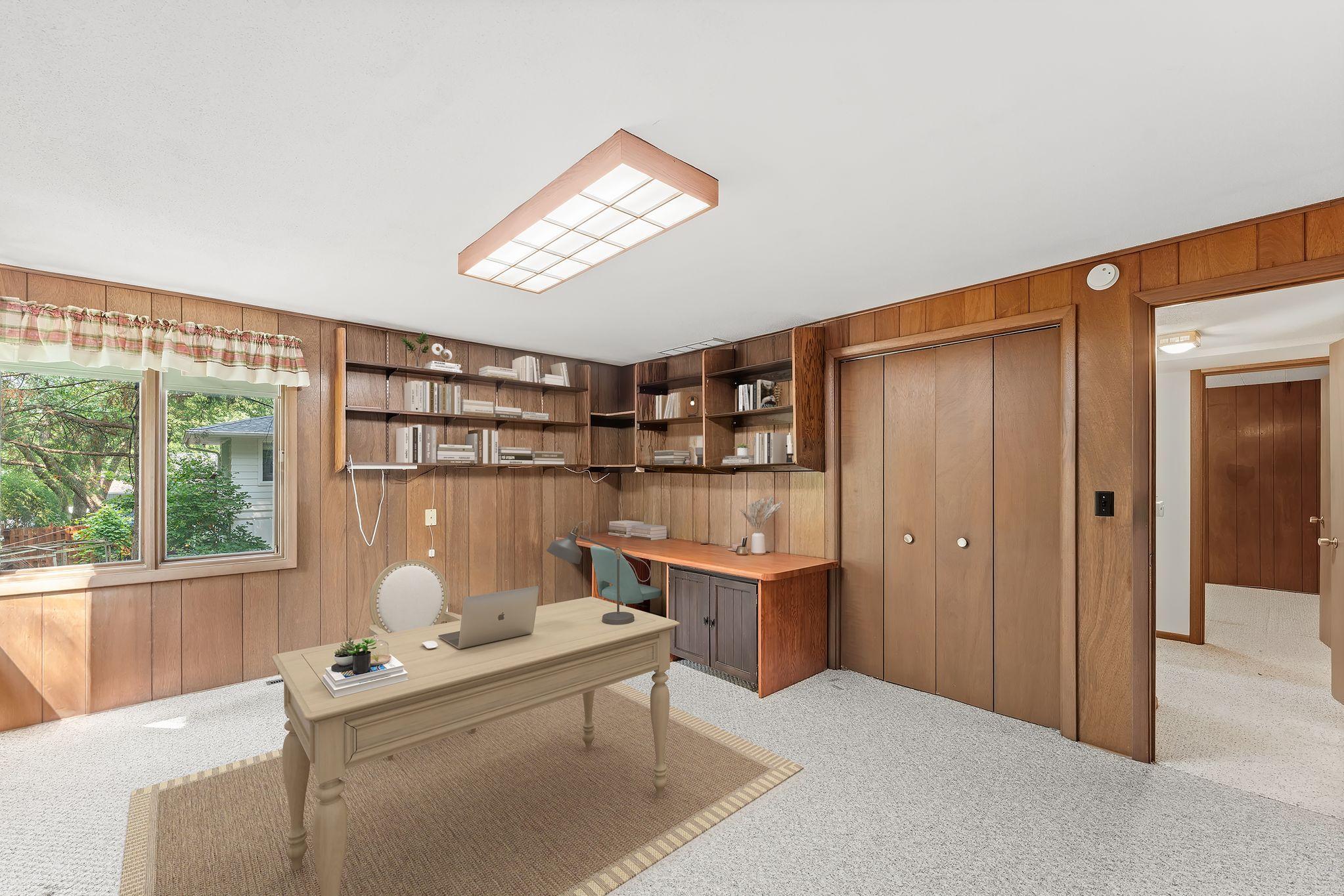 Virtually staged 4th bedroom in the lower level. The current owners used this room as an office