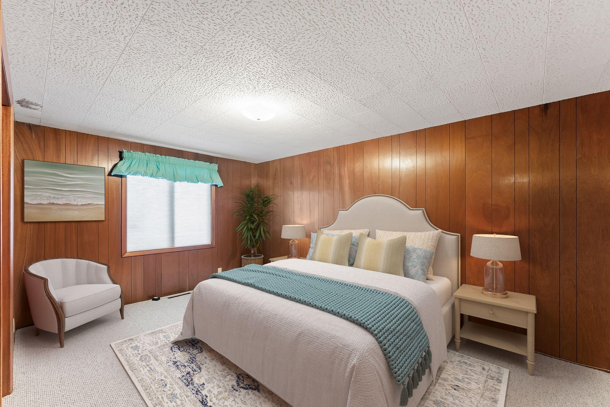 Virtually staged 5th bedroom in the lower level of the home