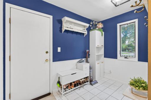 Recently updated large mudroom entry from the garage