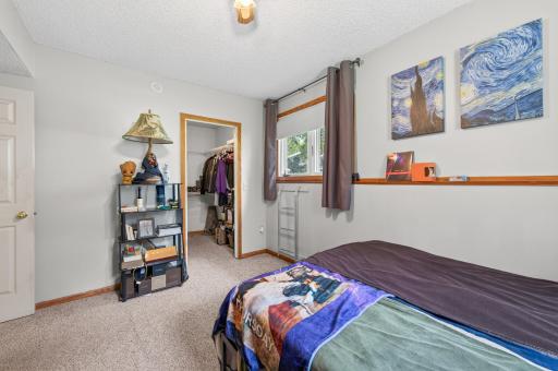 Walk in closet and lots of natural light with ceiling fan