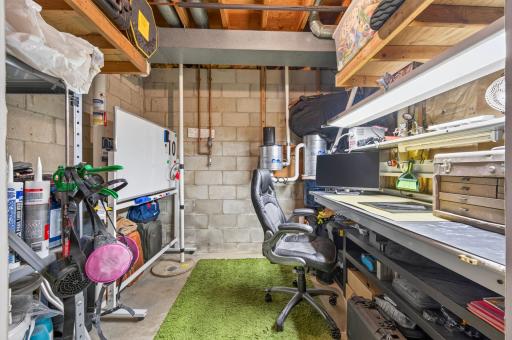 Additional storage/workspace in unfinished portion of lower level