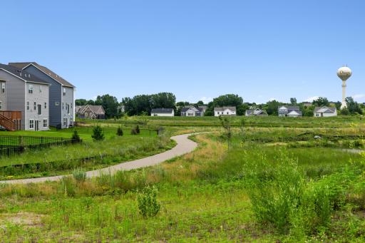Get your steps in on the walking trail and enjoy the beauty of your new community!