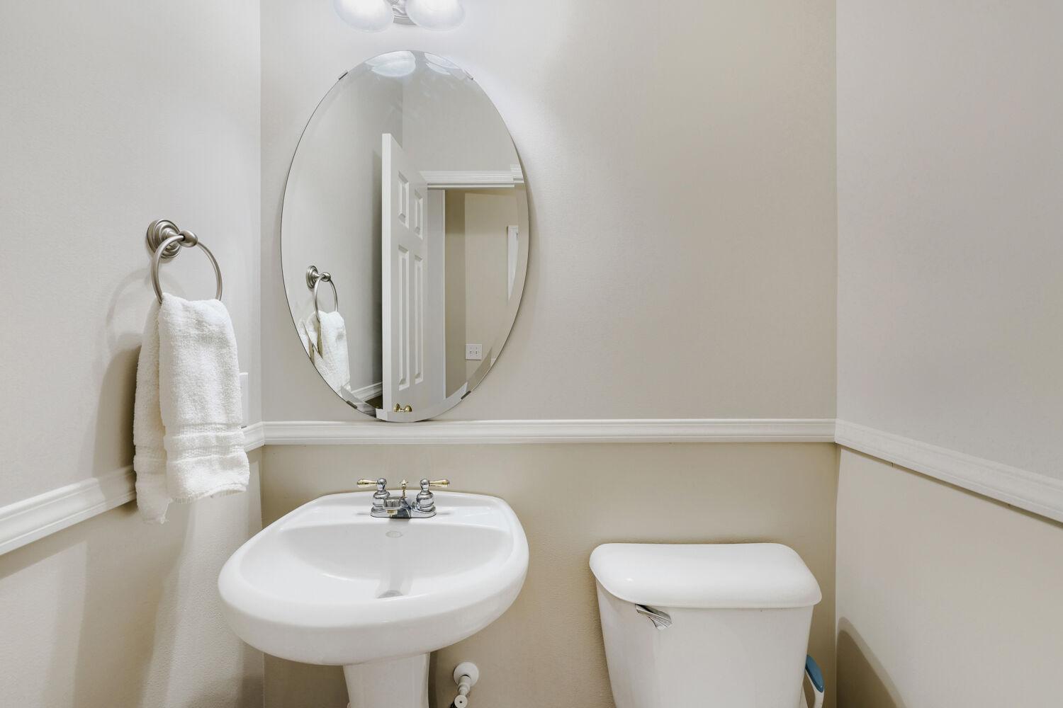 17285 Wilderness Trail SE - Web Quality - 019 - 19 Powder Room.jpg