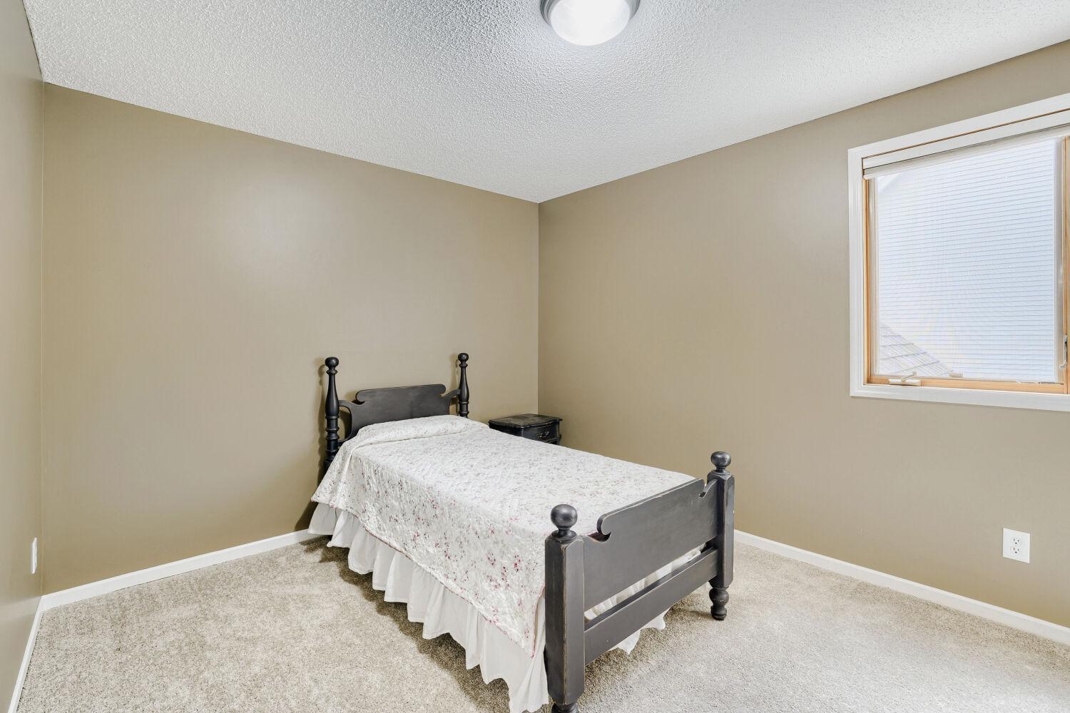 17285 Wilderness Trail SE - Web Quality - 026 - 26 Bedroom.jpg