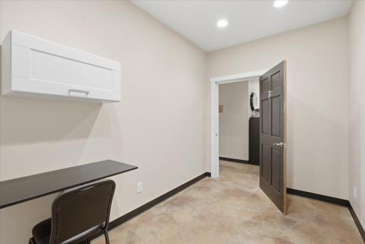 Another exam room, equipped with sink, water and storage
