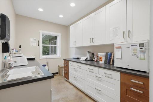 Currently used as a lab, but open to possibilities with tons of storage and sink