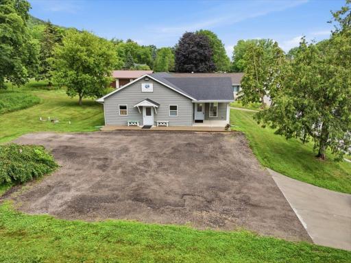 Parking can be hard to find in this adorable town of Stockholm. This property has a spacious yard and parking lot with zero entry doors into the building