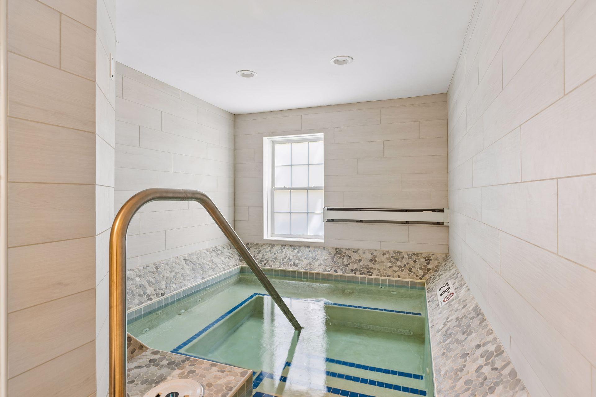 Updated ammenities include an indoor whirlpool, exercise room and..