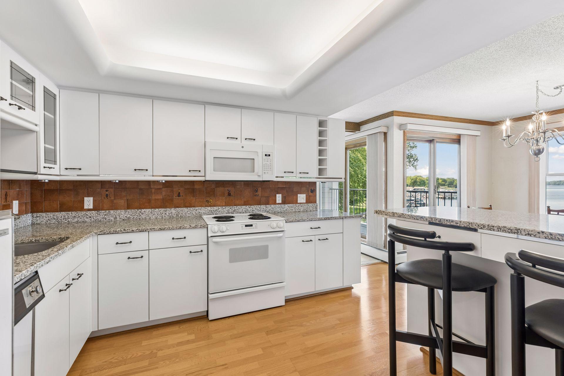 Practical kitchen with plenty of cupboard and counter space