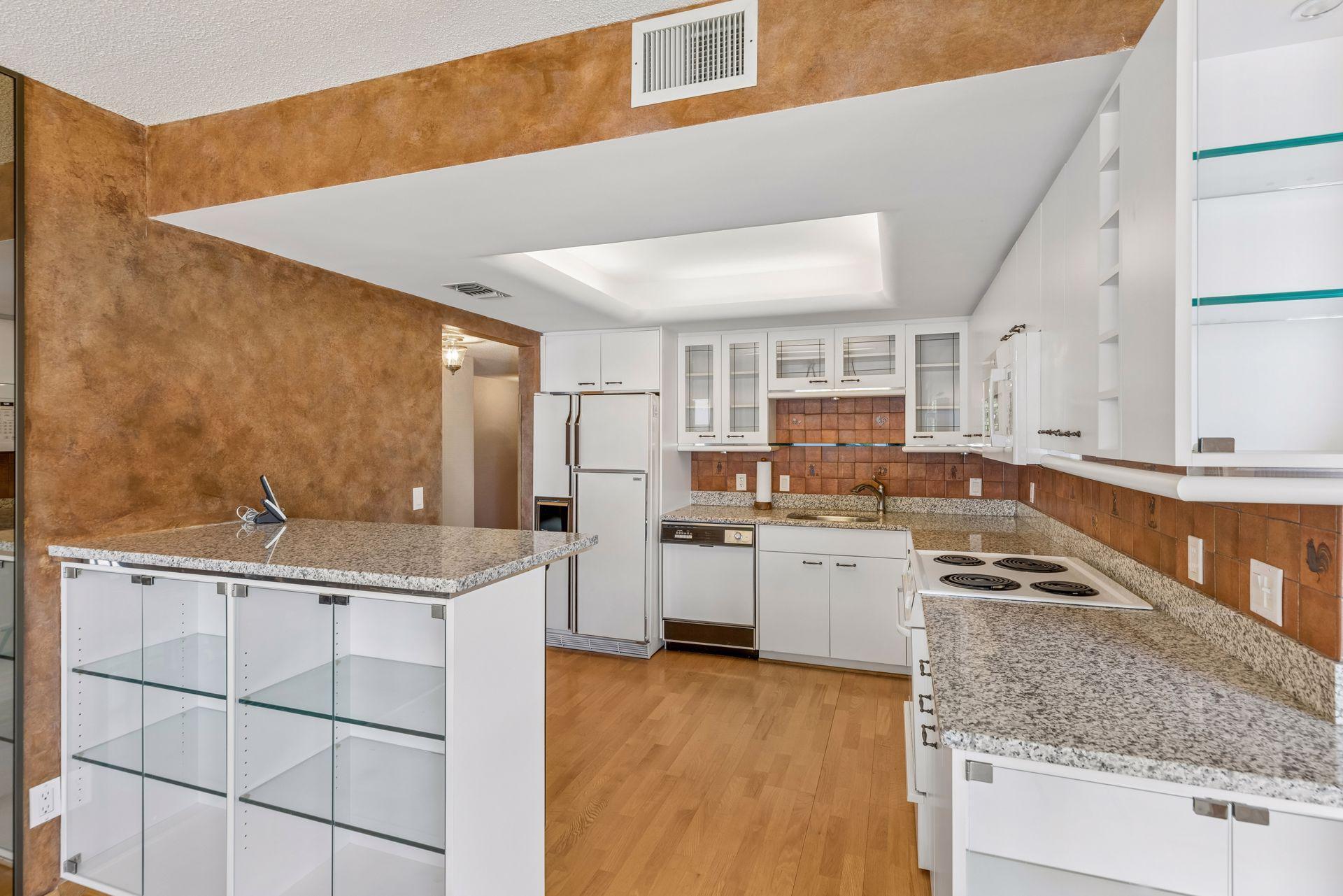 Island penninsula adds seating, countertop and storage