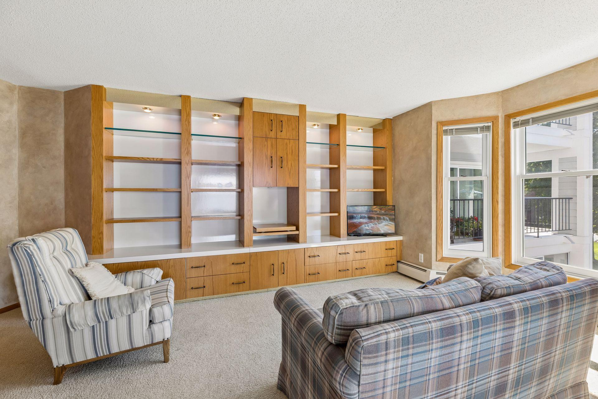 2nd bedroom with a full wall of built-ins is adjacent to the 2nd bathroom and walk-in closet