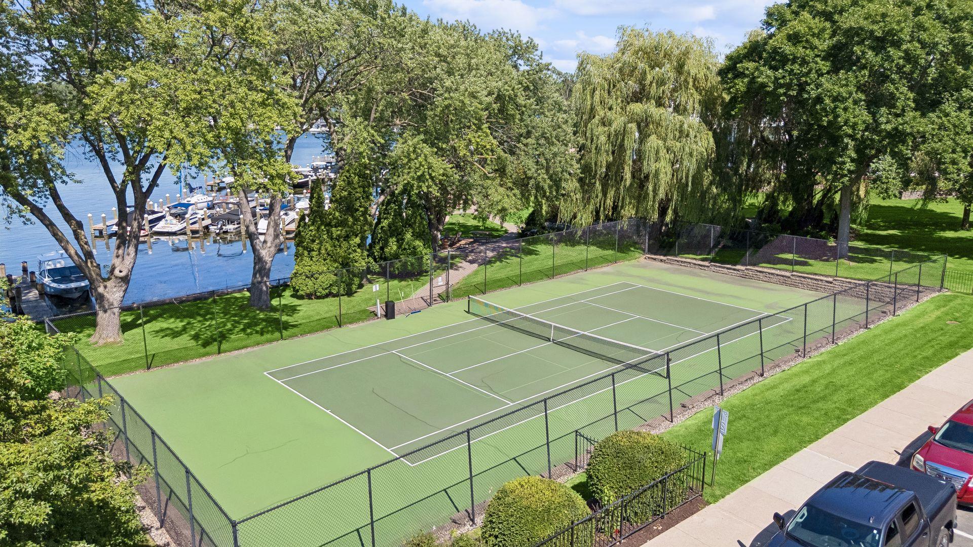 Private resurfaced association owned tennis court