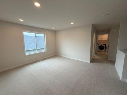 2nd Floor includes 3 bedrooms, laundry room, and sun-filled loft