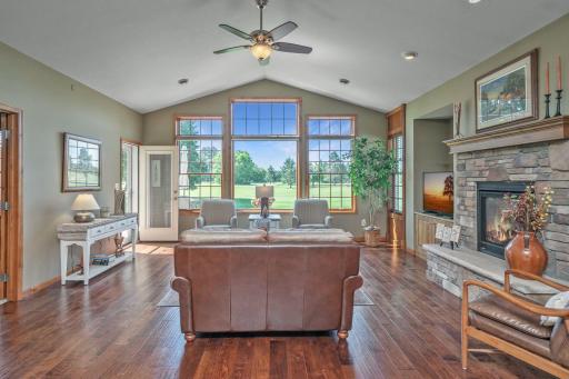 Large windows showcase beautiful golf course views.