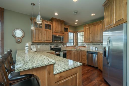Well-appointed kitchen with quality finishes and ample cabinet space.
