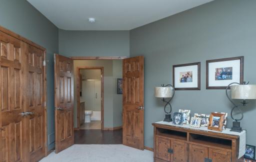 Bright secondary bedroom perfect for guests or a home office.