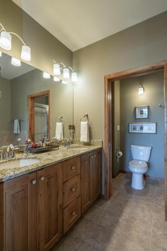 Private primary bath designed for comfort and convenience.