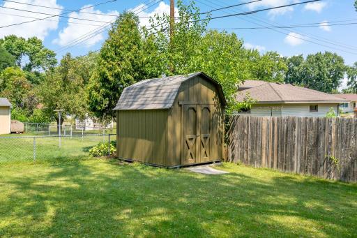 Storage shed for toys and yard equipment
