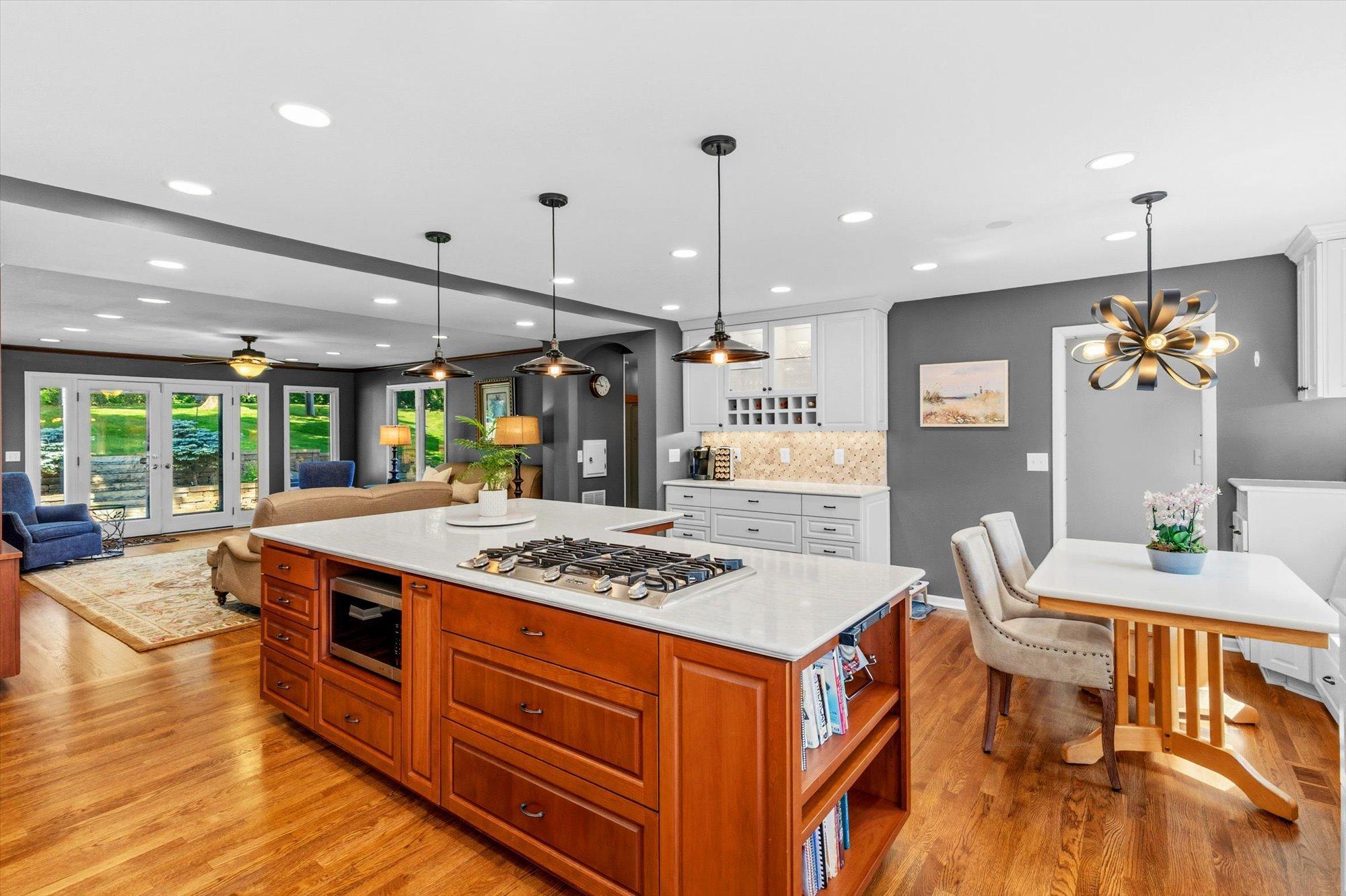 Center Island and in-formal dining just steps to family room and rear yard patio access.