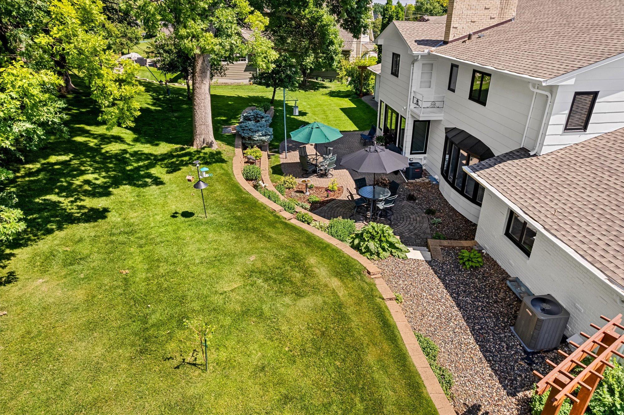 Meticulously maintained landscape frames this beautiful home / property.