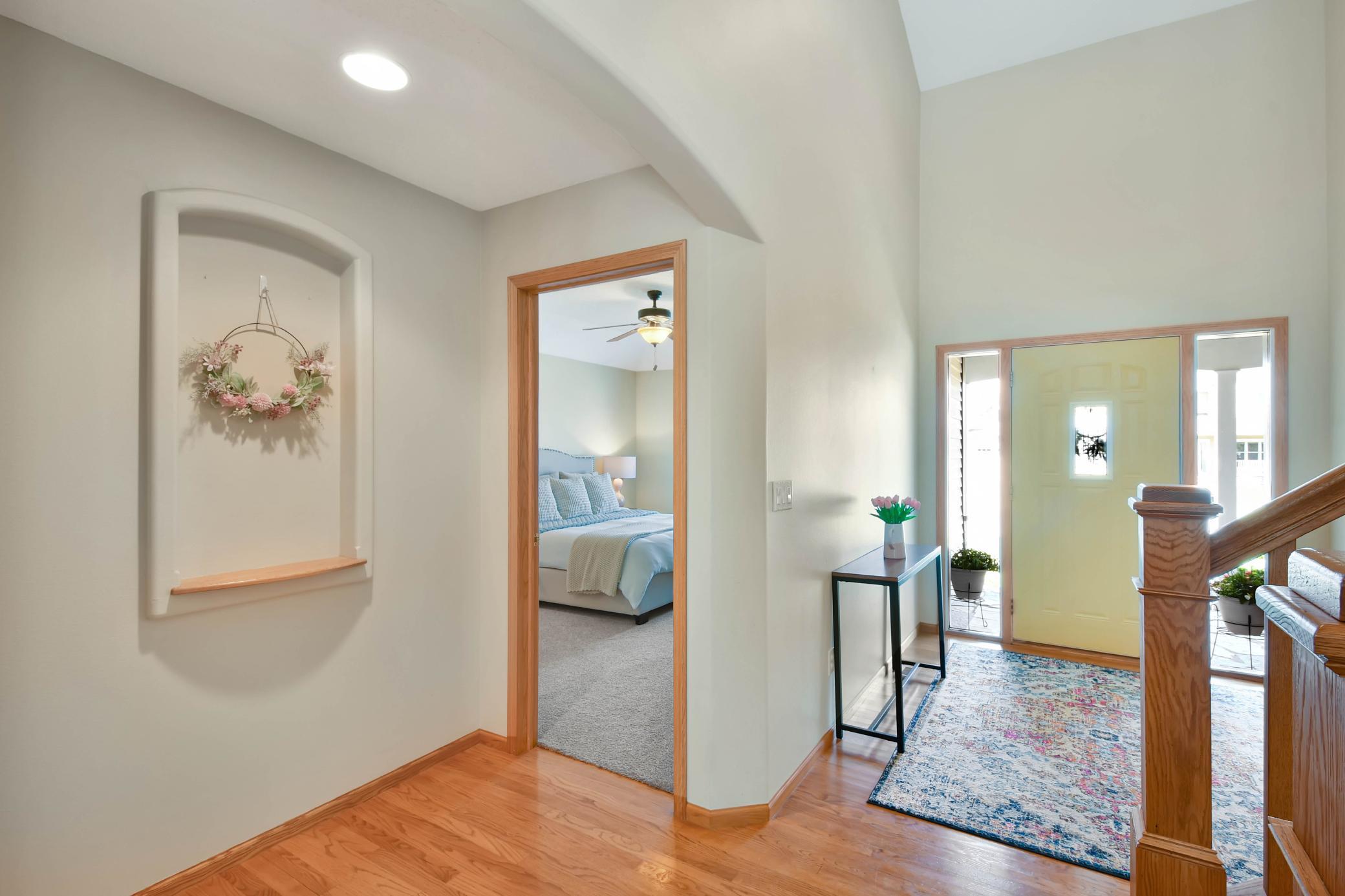 Foyer to primary main floor bedroom