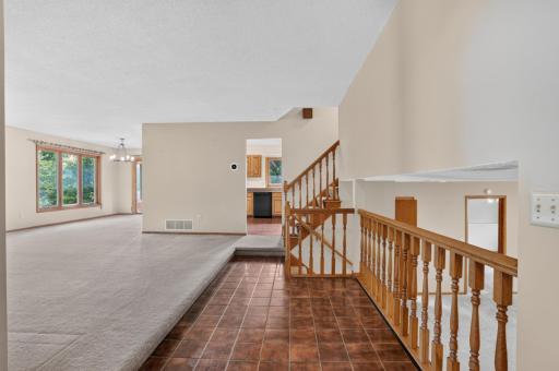 Large Main Level entry opens to living room and lower level family room