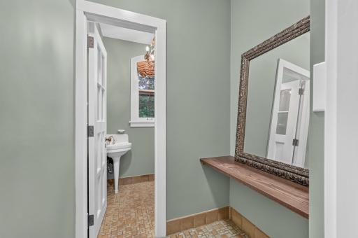 Charming powder room vestibule