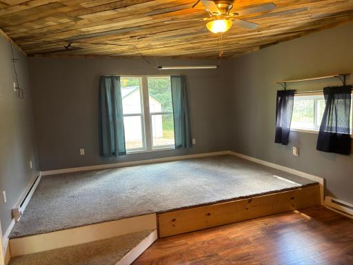 Main bedroom has a platform that would fit a king size bed:)