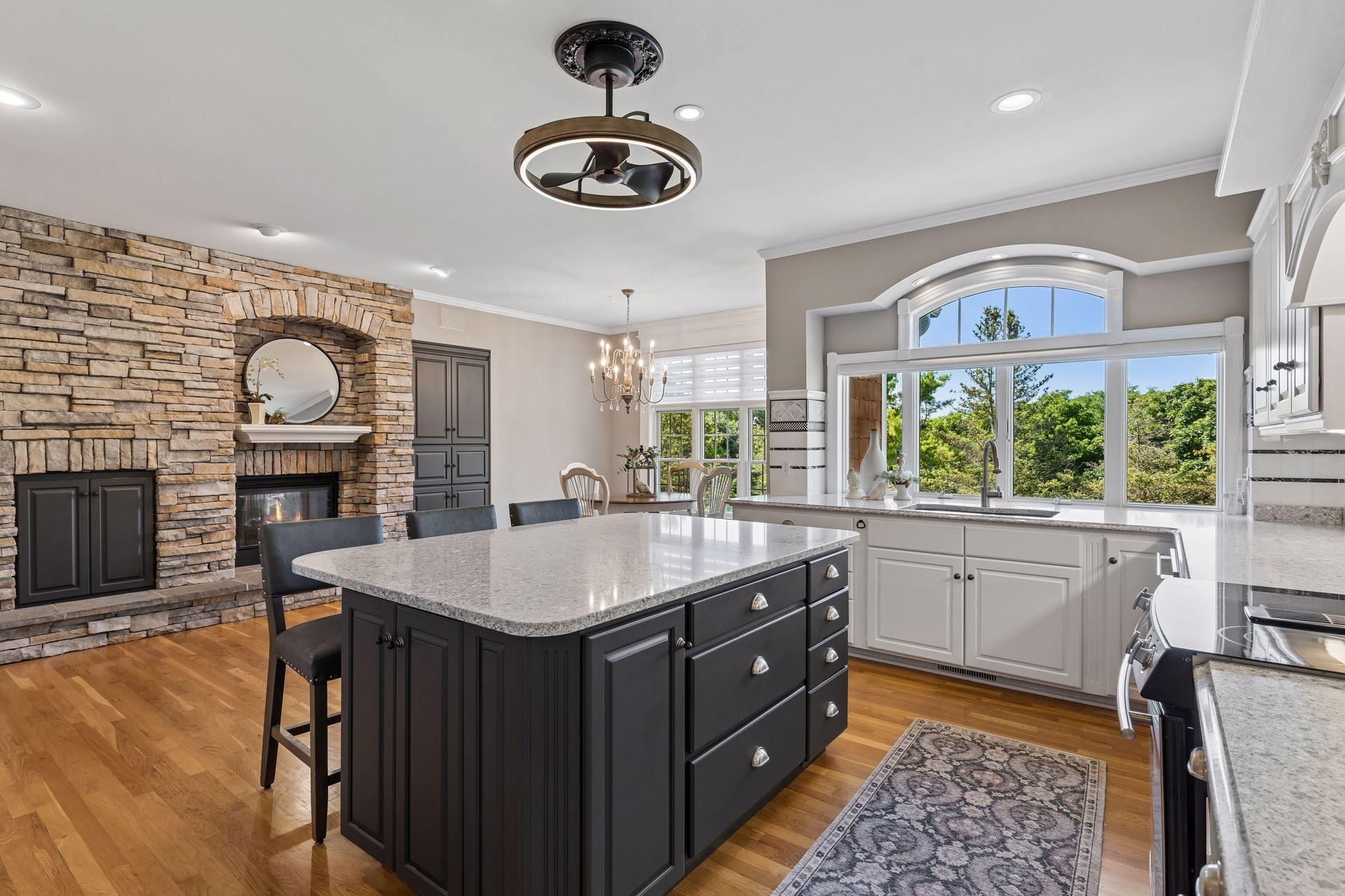 Designed for everyday living and entertaining, the Kitchen flows seamlessly into the Hearth Room, creating an inviting gathering space.
