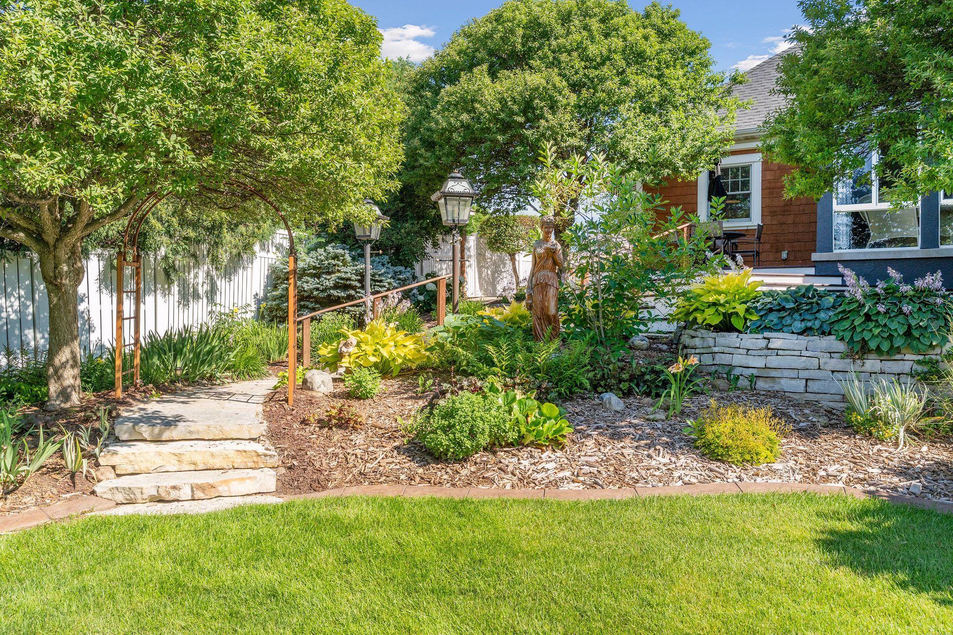 Garden Path - Every pathway reveals another beautiful surprise, from colorful perennial gardens to peaceful sitting areas and carefully selected landscape features.