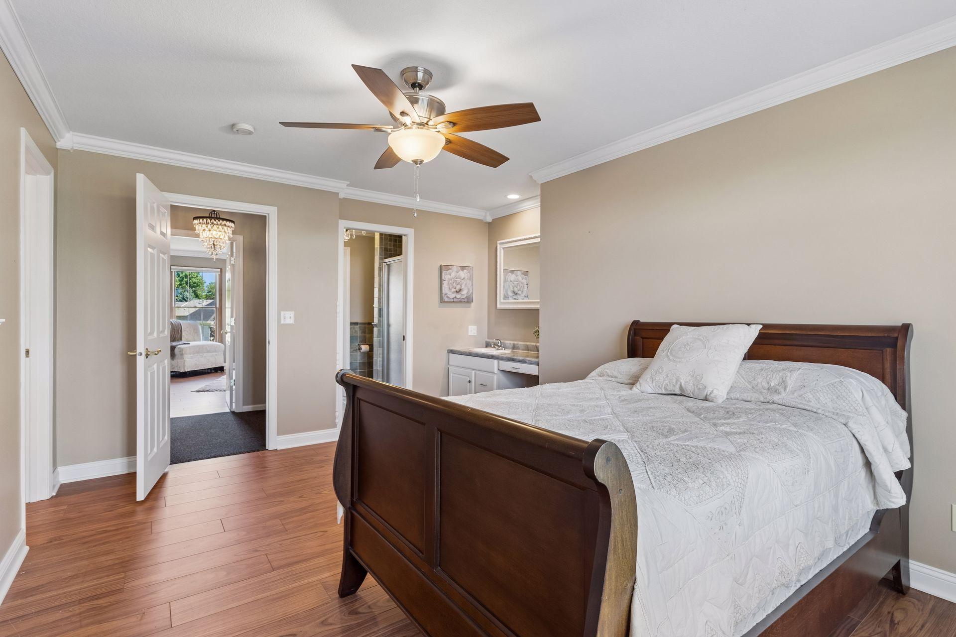 This Bedroom includes its own private vanity and sink with direct access to the shared Jack-and-Jill Bath. It also has a walk-in closet.