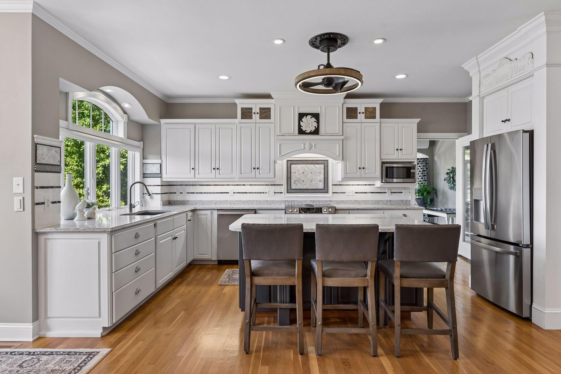 Abundant cabinetry, generous Quartz countertop space, and quality finishes make this Kitchen as functional as it is beautiful.