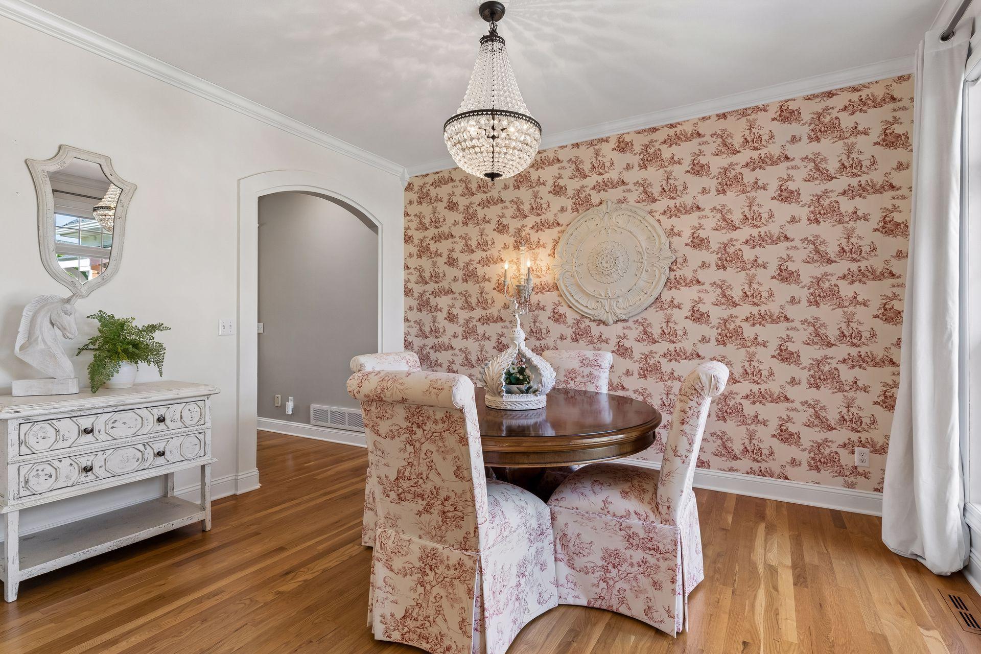 From the elegant chandelier to the archways and custom millwork, every detail reflects the timeless craftsmanship that makes this home truly one of a kind.