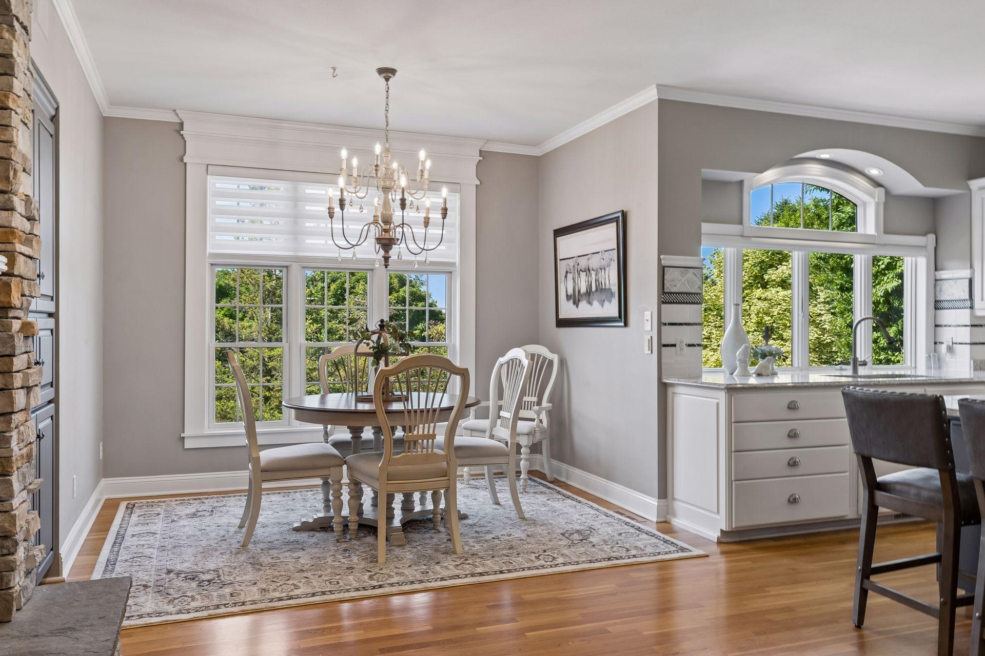 Open sightlines between the Kitchen and Hearth Room create a comfortable layout.