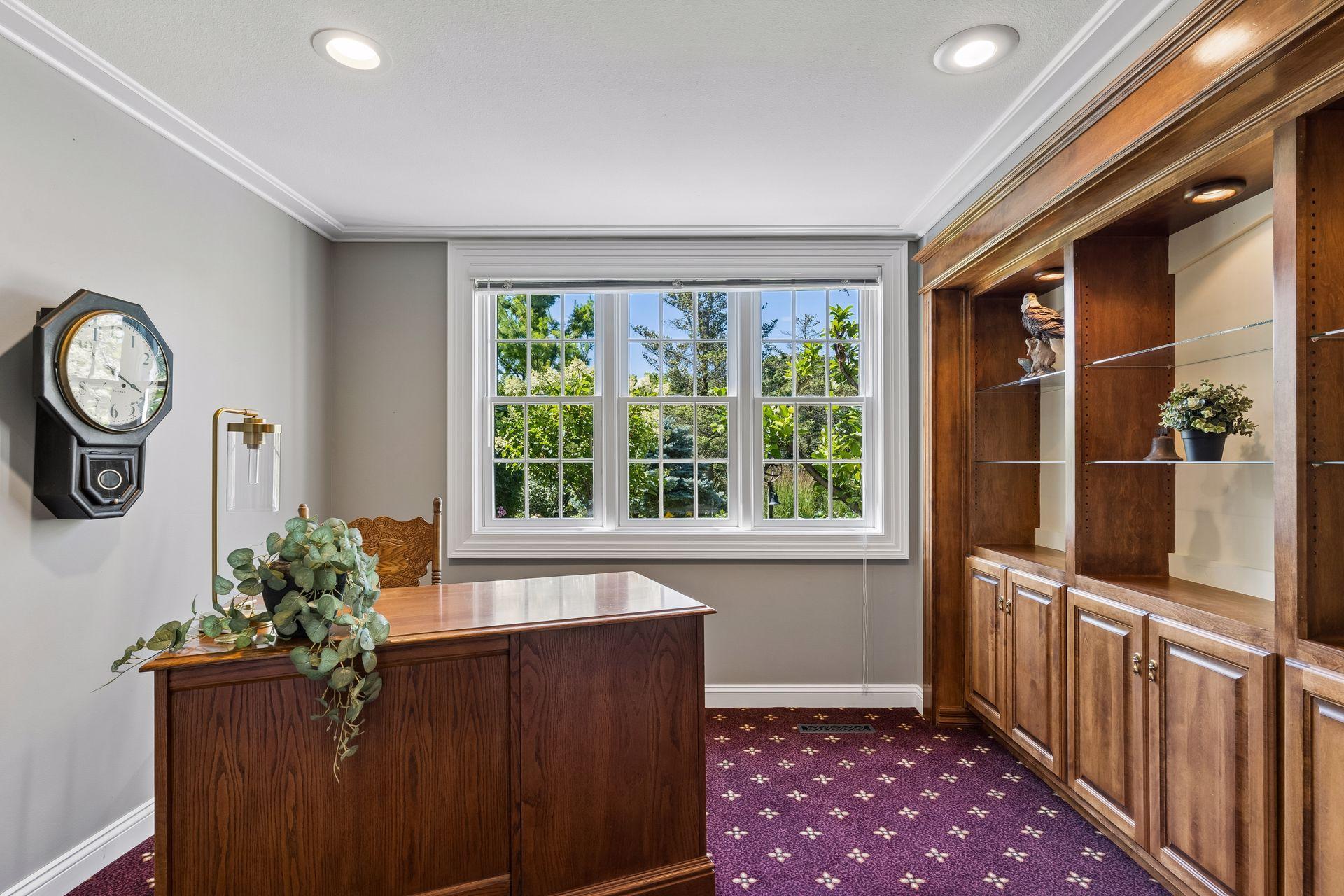 The lower Office has custom built-ins and offers an ideal space for working from home, reading, or managing household projects.