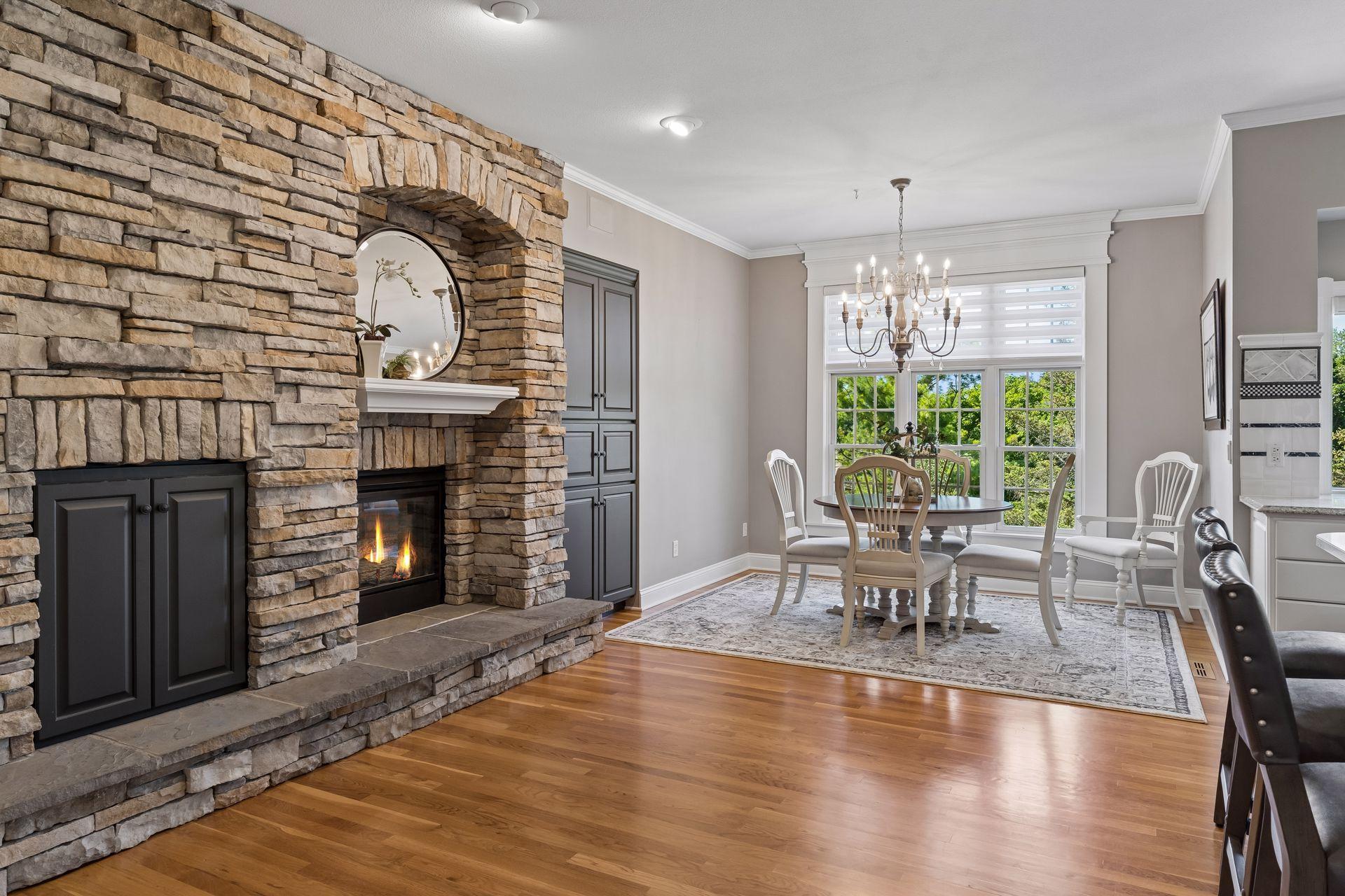 The Hearth Room offers the perfect spot to enjoy morning coffee or casual meals beside the warmth of the see-through Gas Fireplace.