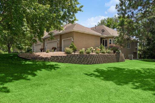 4BR, 3BA, 3500FSF, 3-car garage, and lakeshore! Exceptional twinhome with townhome amenities.