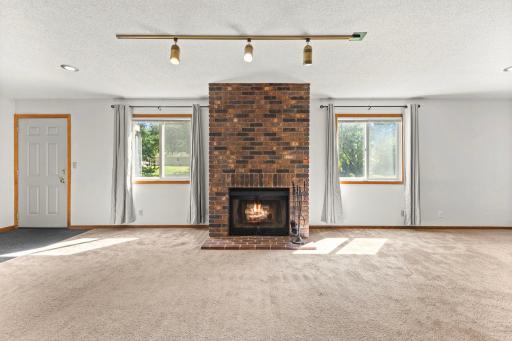 Walk out lower level with family room with wood burning fireplace
