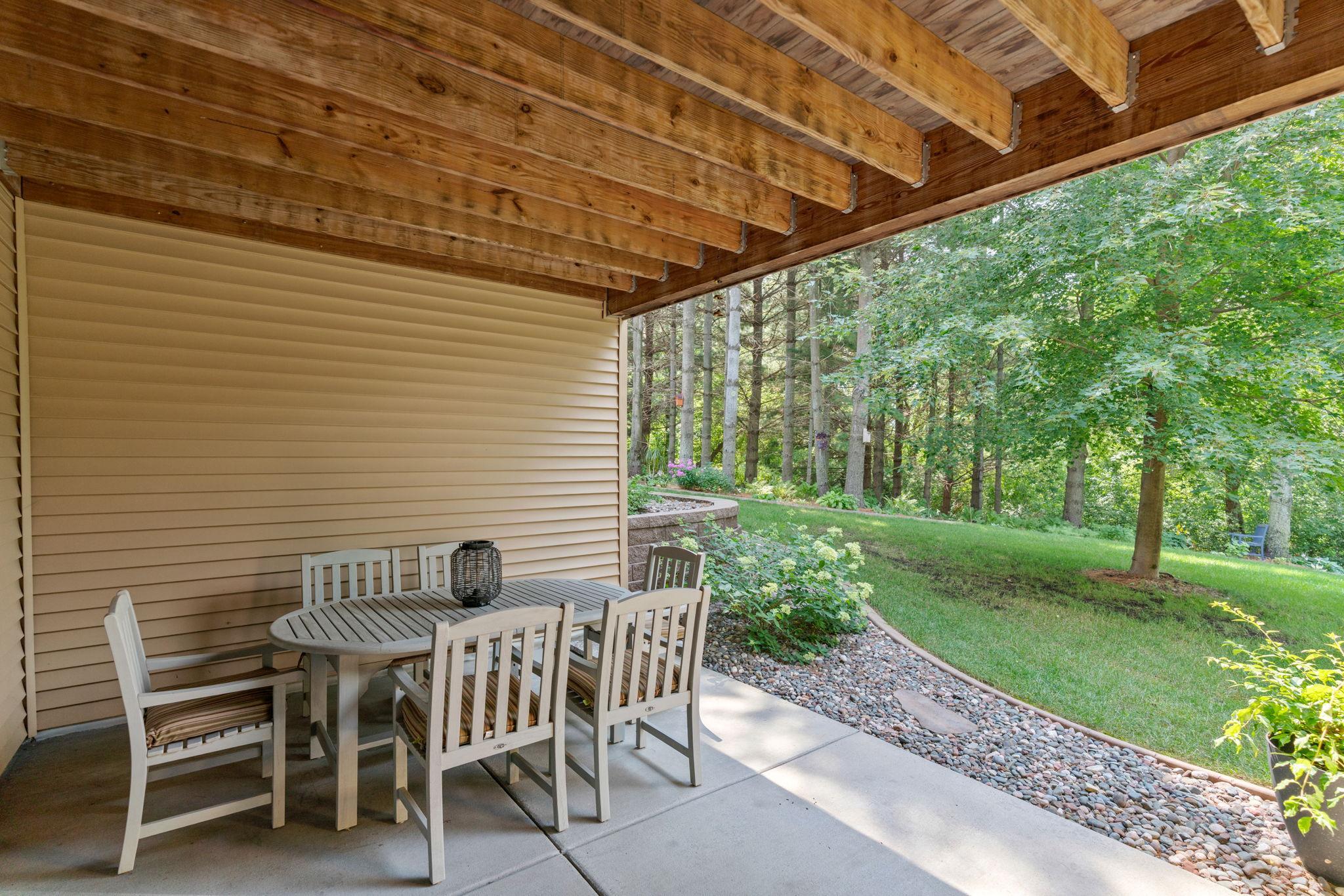 Walk out Lower Level to covered, concrete porch.
