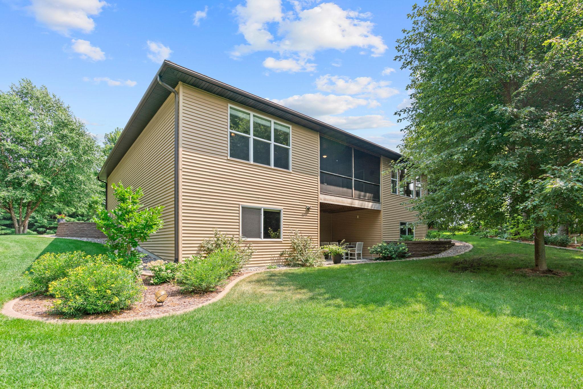 Both screened-in & Lower Level covered, concrete porch.