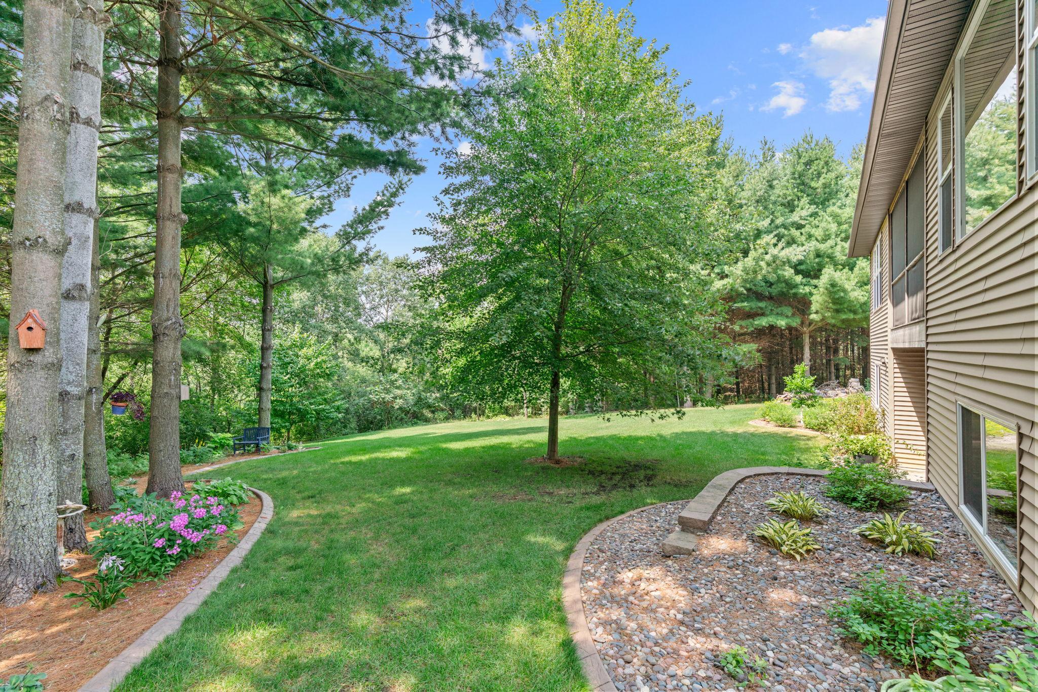 2.5 acre private lot with stunning landscaping