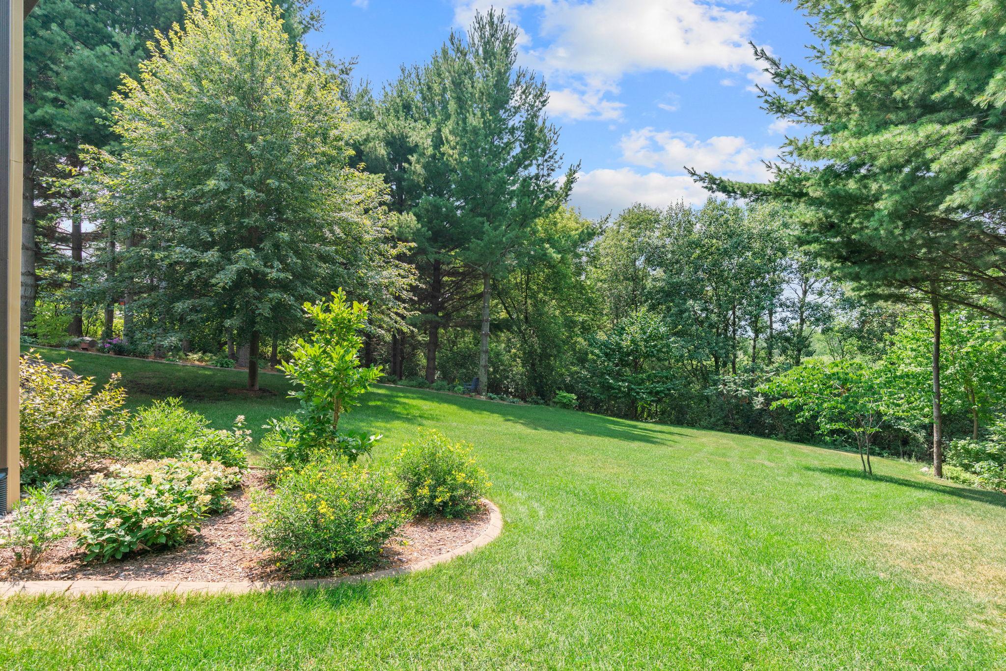 2.5 acre private lot with stunning landscaping
