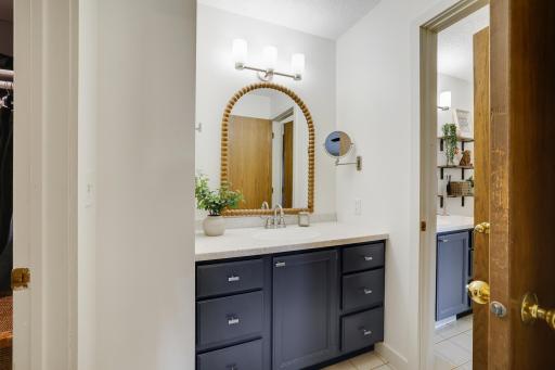 Additional sink and mirror outside the bathroom makes getting ready in the morning easy