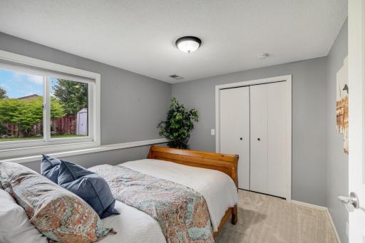 Lower level bedroom is across the hall from the 3/4 bathroom. This makes a great guest space