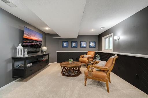The lower level family room is spacious and includes brand new carpet