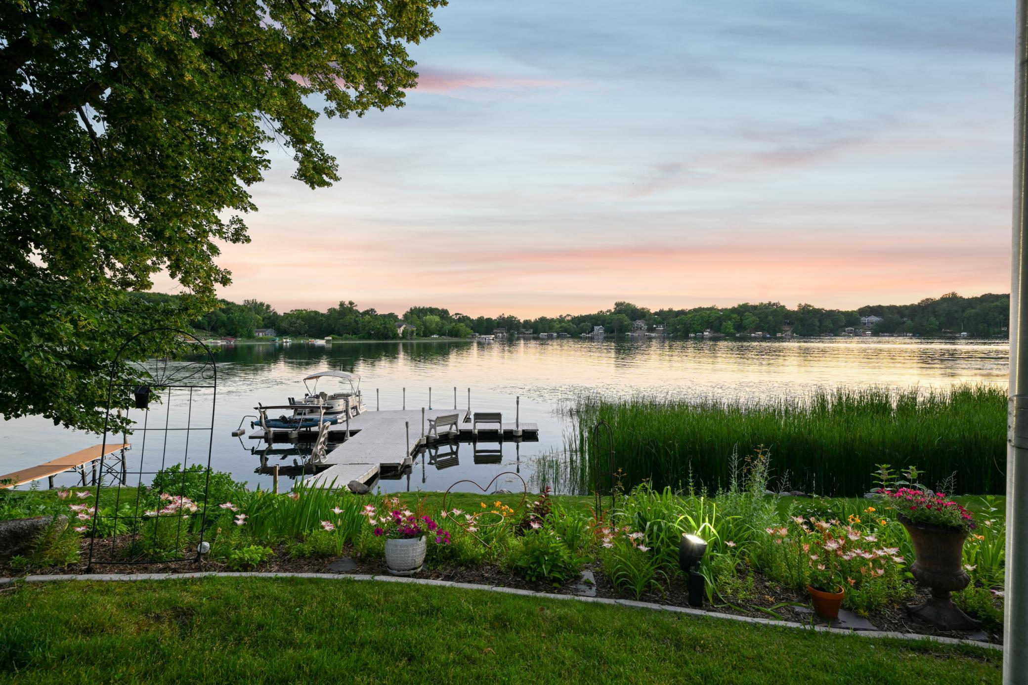 This property features 385 feet of shoreline with two ideal beach areas for swimming, boating, and fishing. Separated by a natural buffer for added privacy and tranquility.