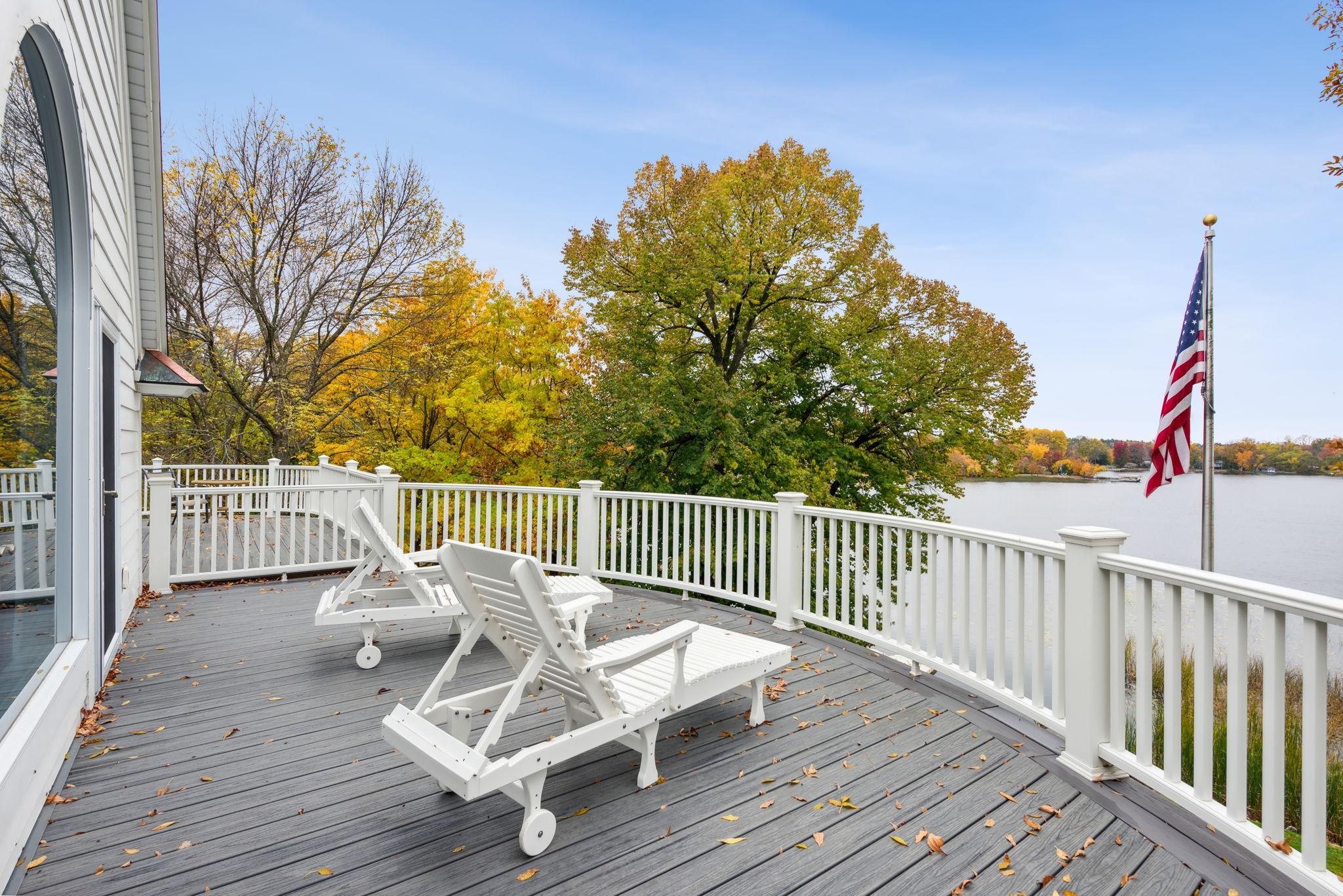 The primary suite features a private balcony with composite decking and sweeping views of Lake Sylvia. Ready for you to enjoy peaceful sunsets over the water.
