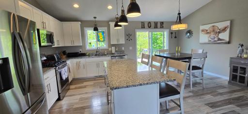 large center island with granite countertops