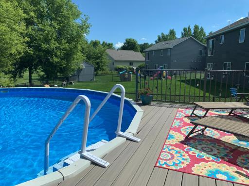 Lower deck offers a great place to relax by the pool