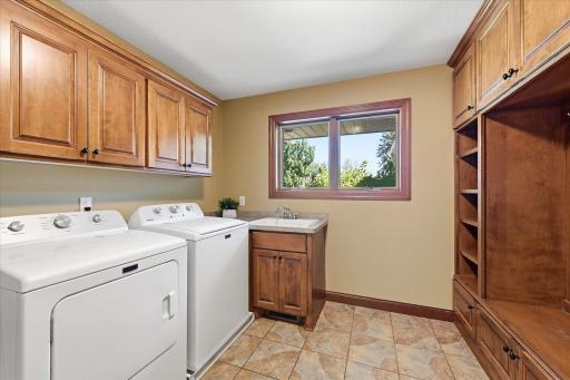 Main level laundry. Functional space with thoughtful storage.